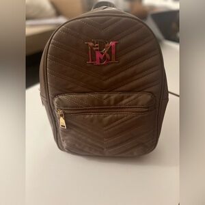 Badgley Mischka quilted backpack